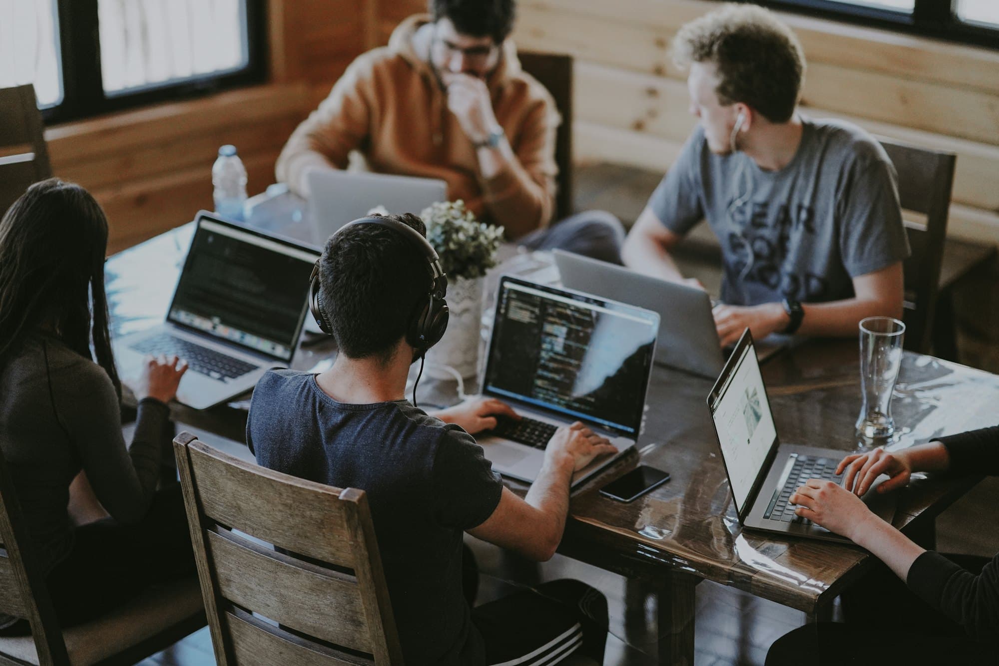Team working at laptops in a shared studio